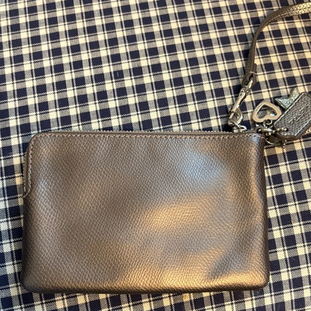Coach Brown Pebbled Leather Wristlet with Silver Star & Heart Charms